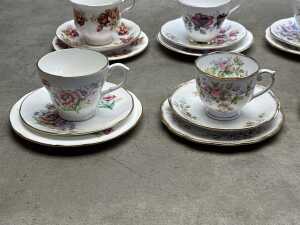 Eight porcelain trios - 4
