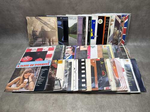 Assorted vinyl records, including Paul McCartney