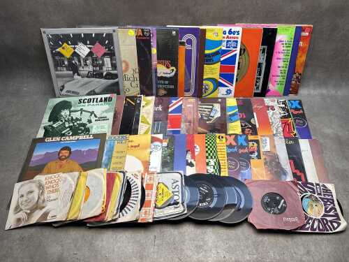 Assorted vinyl records, including LPs and 45s, including Moody Blues
