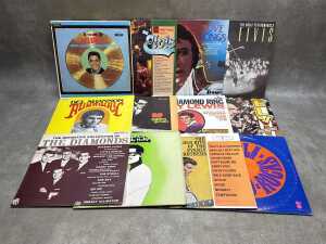 Twelve Rock 'n' Roll vinyl records, including Elvis Presley,