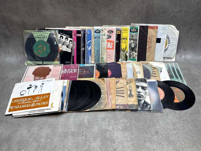 Mostly 1960s 45rpm 7" vinyl singles and EPs, including Jimi Hendrix Experience