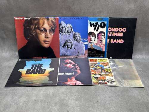 Eight Rock vinyl records, including the Rolling Stones