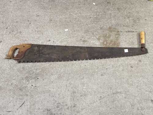 Vintage cross-cut logging saw