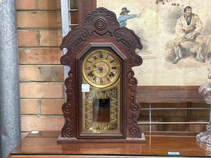 Antique gingerbread-style mantle clock