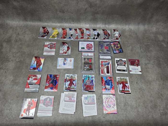 Group of soccer collector cards, including graded