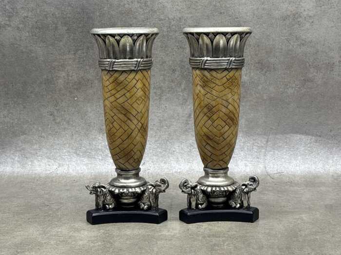 Pair of Egyptian-style decorative candle stands