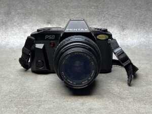 Four film cameras including Canon - 2