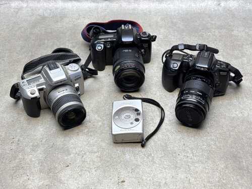 Four film cameras including Canon