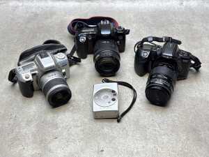 Four film cameras including Canon