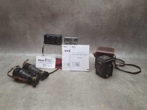 Three cameras, plus antique binoculars