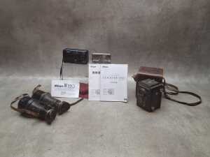 Three cameras, plus antique binoculars