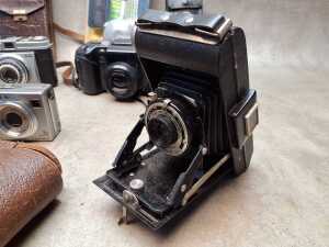 Assorted cameras and accessories, including Kodak - 6