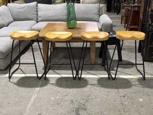 Set of four timber saddle bar stools