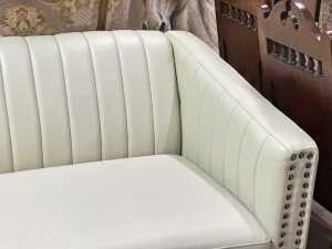 Contemporary cream upholstered two-seater sofa - 2
