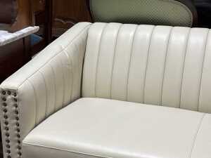 Contemporary cream upholstered two-seater sofa - 2