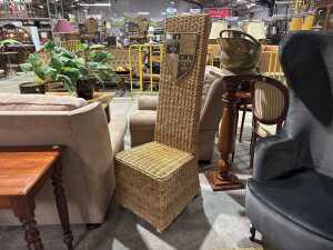 High back wicker chair featuring Edward 111 coat of arms (Why!)