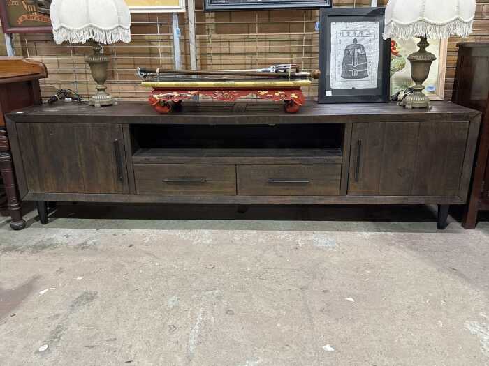 Dark timber low entertainment unit