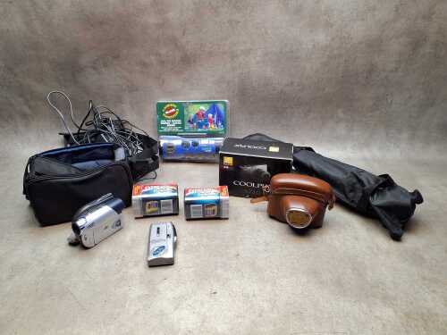 Cameras and photographic equipment including Nikon digital point and shoot