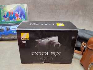 Cameras and photographic equipment including Nikon digital point and shoot - 4