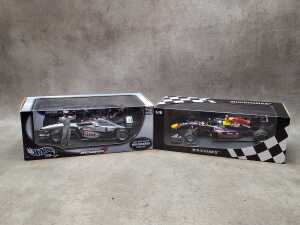 Two racing model cars, Minichamps and Hot Wheels
