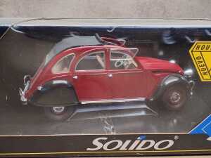 Two die cast model cars, including Prestige and Maisto - 2