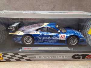 Two die cast model cars, including Prestige and Maisto - 4