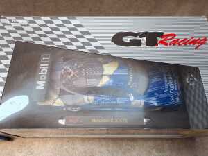 Two die cast model cars, including Prestige and Maisto - 5
