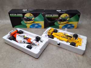 Two Ayrton Senna 1:18 scale model cars