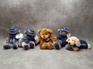 Two Victoria Police Blue Ribbon teddy bears and others
