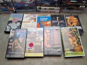 VHS video tapes, mostly nostalgia titles, including Joe Versus the Volcano - 3