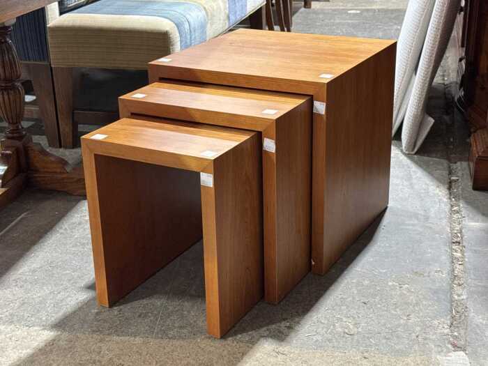 A nest of three tables