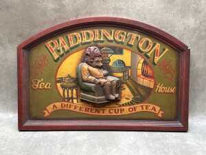 'Paddington Tea House' hand-painted timber sign with carved Paddington to centre