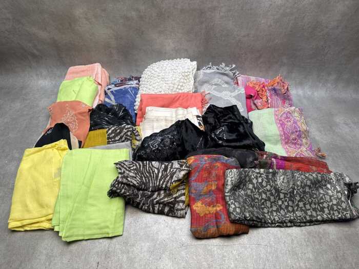 Collection of scarves in various colours and fabrics