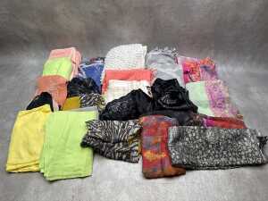 Collection of scarves in various colours and fabrics