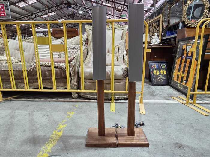 Pair of Sharp LCD TV speakers on stands