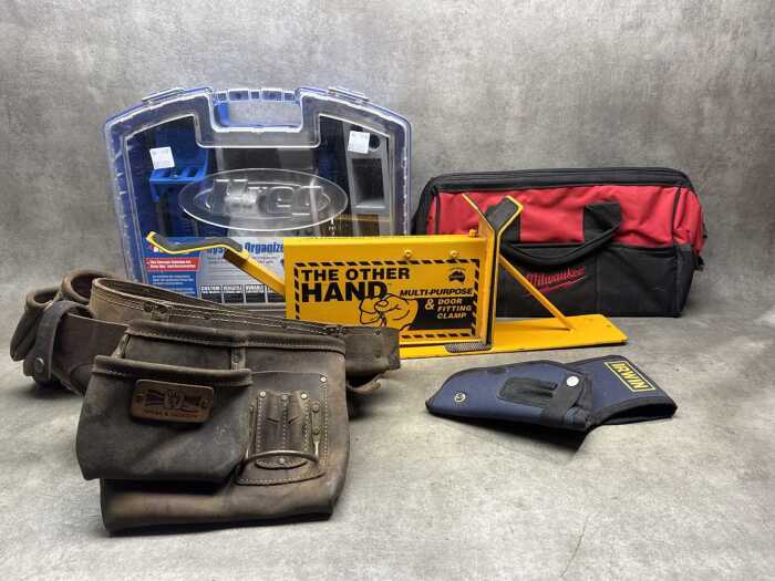 Assorted tools and accessories, including a Milwaukee bag
