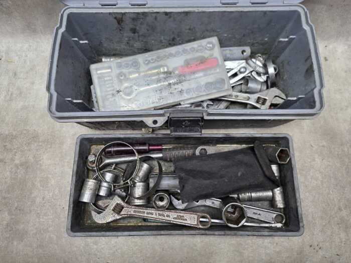 Assorted hand tools in tool box