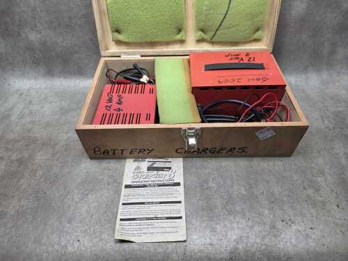 719 · Two battery chargers in timber case