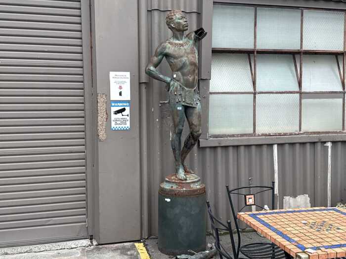 Decorative cast-iron African-style male figure statue