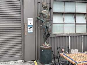 Decorative cast-iron African-style male figure statue