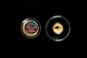 Two mini gold proof coins, 0.5g