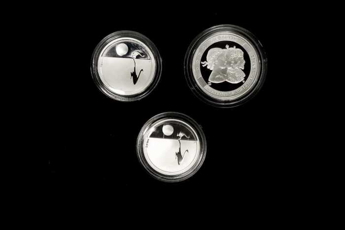 Three silver proof coins