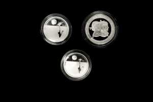 Three silver proof coins