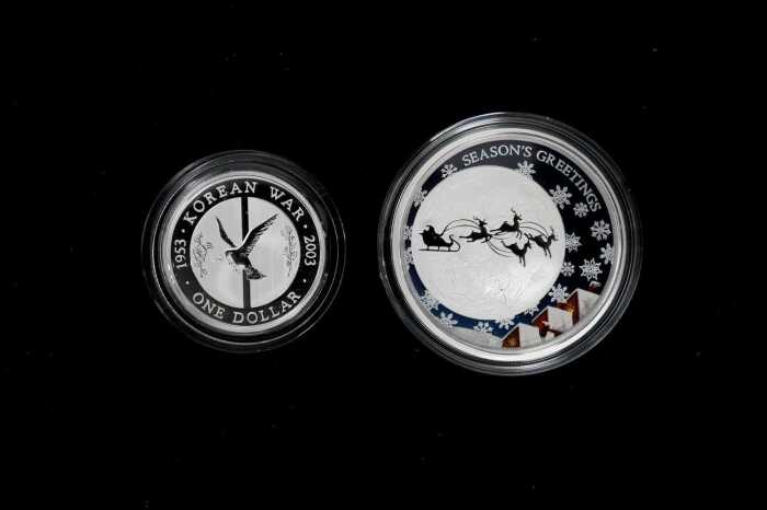 Two silver proof coins