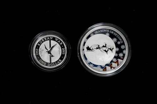 Two silver proof coins
