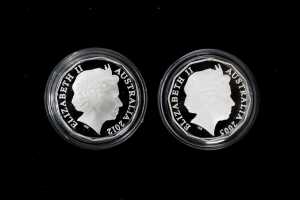 Two 50c silver proof coins totalling $1 and 36.48g 99.9% pure silver - 2