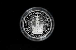 Two 50c silver proof coins totalling $1 and 36.48g 99.9% pure silver - 3