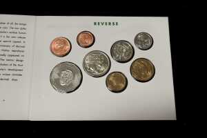 Three eight-coin uncirculated sets and two six-coin uncirculated sets - 7