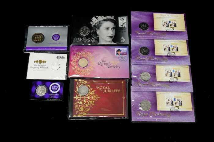 Group of assorted royalty themed collectable coins and PNCs