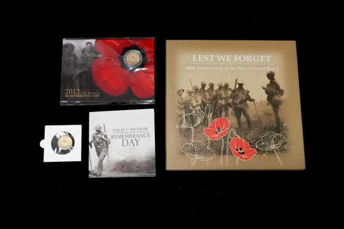 Group of remembrance themed collectable coins